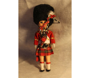 Muñeca escocesa de recuerdo vintage con gaita